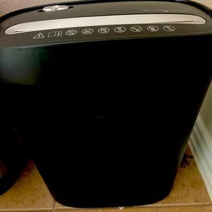 One black paper shredder with attached can!